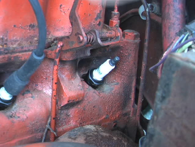 Pulling And Replacing Spark Plug Wire In An Old Engine
