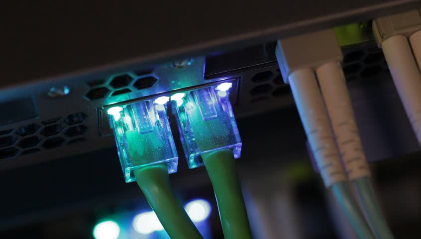 Ethernet & fiber optic cables connected to server showing transfer of data