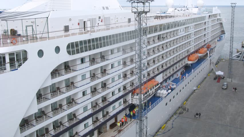 Traffic near cruise liner stationed at Tallinn bay, top-down view, time lapse