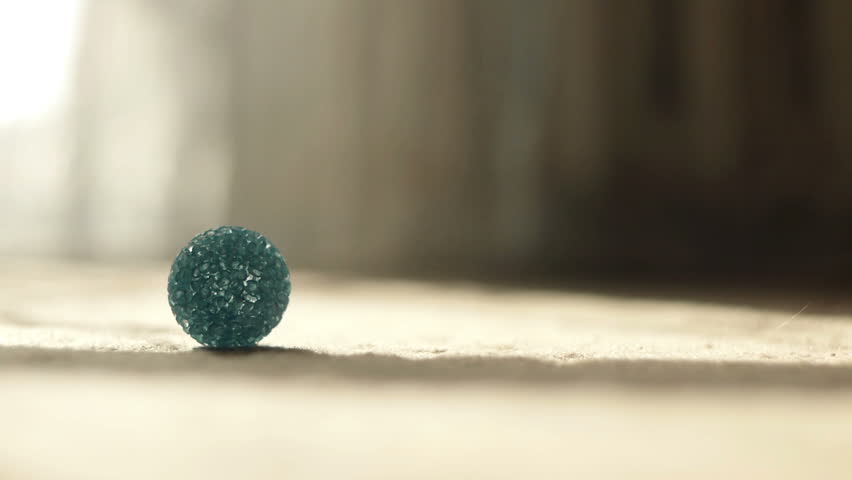 Black Kitten Plays With Blue Ball.