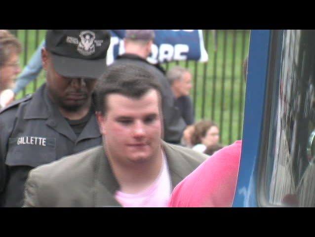 WASHINGTON DC - JANUARY  20: 
Zoom-in on the handcuffs on an anti-Iraq-war protester arrested at a rally in Washington DC on January 20, 2005. 