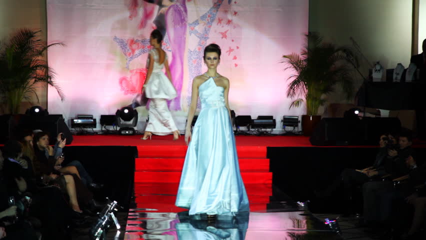 MOSCOW - FEBRUARY 14: Model in long white French couture wedding dress walks catwalk at Evening of French fashion in salon Estet, on February 14, 2011 in Moscow, Russia. 