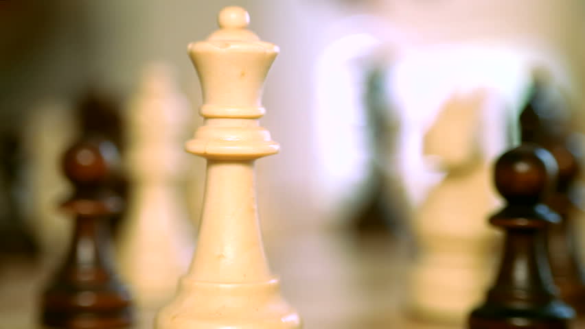 Two chess moves: white queen takes black queen and black queen takes the white queen.