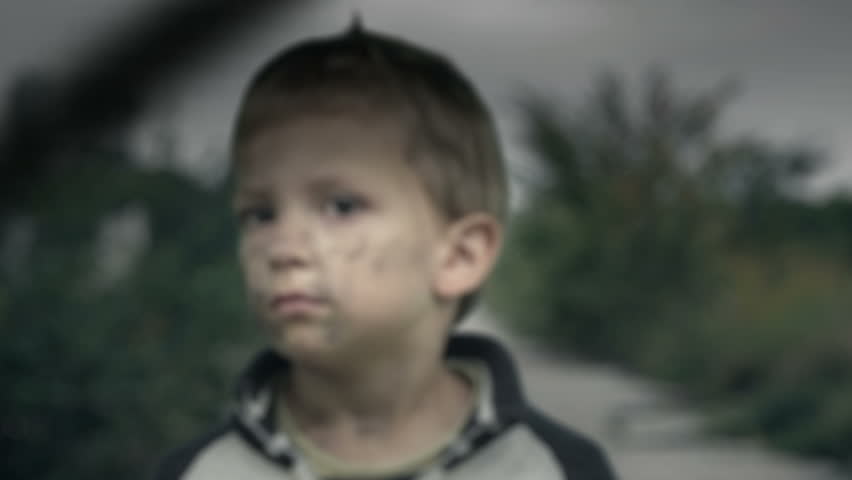 Abandoned. Lonely boy behind a fence, an orphan in refugee camp. Homelessness. Child in slums. Camera dolly.
Canon 7d, HD 1080 25p
Clip ID: boy4_HD