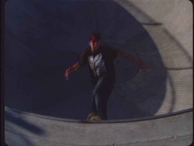 VENTURA, CA - CIRCA 2006: A boy does an exciting jump on his skateboard in slow-motion circa 2006 in Ventura.