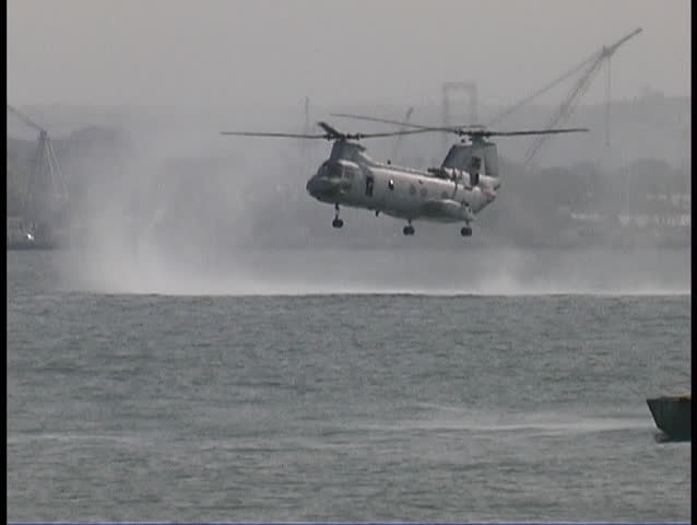 Recon Marines helicasting out of a CH-46 helicopter