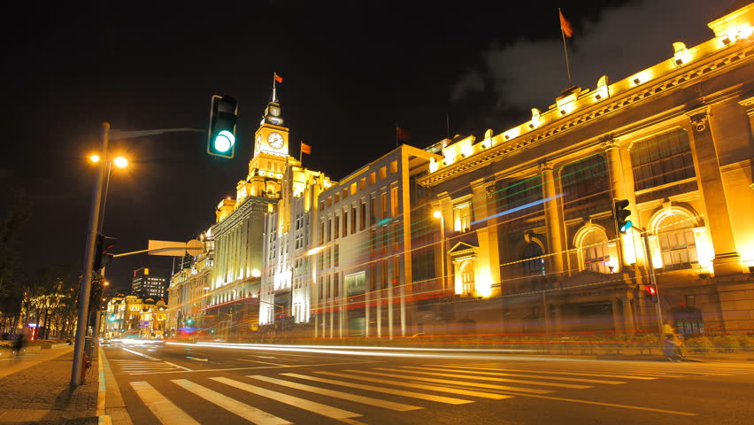 Cityscape timelapse at night. The bund traffic in Shanghai, China.