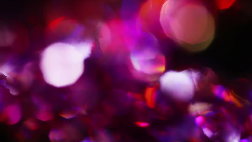 Abstract color bokeh circles background in violet tones