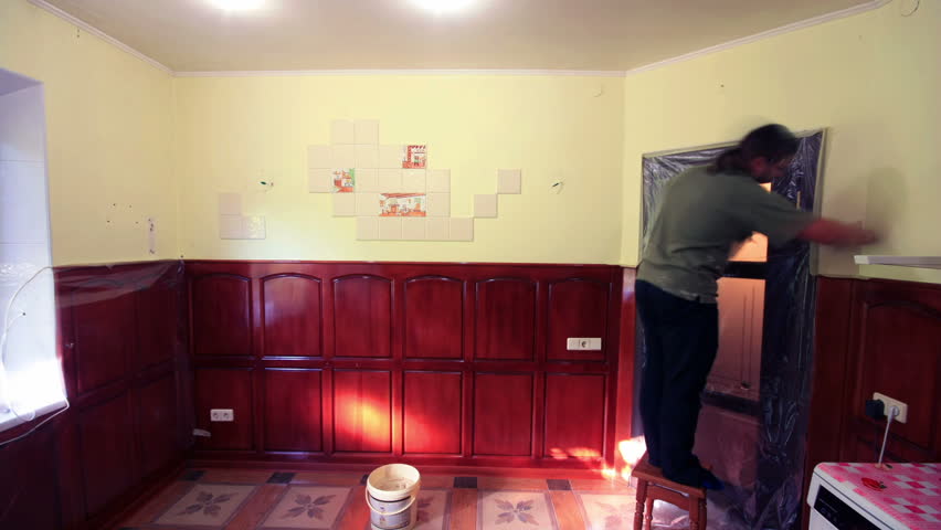 master applies decorative plaster on the wall. Timelapse. 