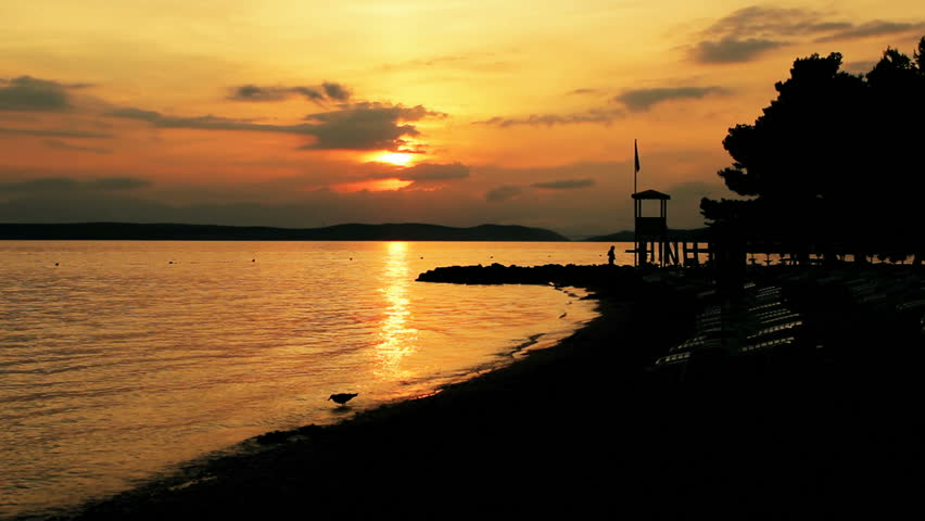 Sunset at coast of the sea