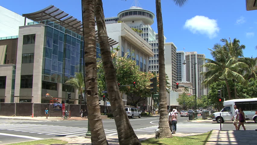 OAHU, HI - CIRCA OCTOBER 2011: 
Waikiki street scene with pedestrians walking circa October 2011 in Oahu Hawaii. 