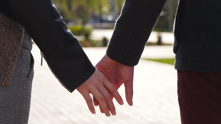 Boyfriend holding hands with obama