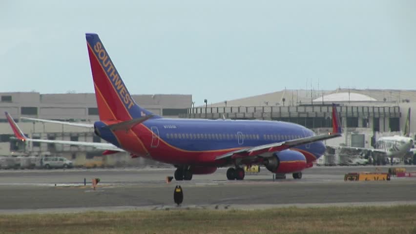 LOS ANGELES - CIRCA 2008: A Southwest Airlines jet sits on an airport tarmac.