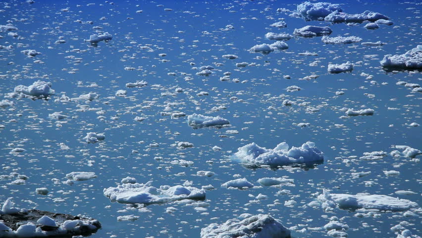 Small Craft Between Melting Ice Floes