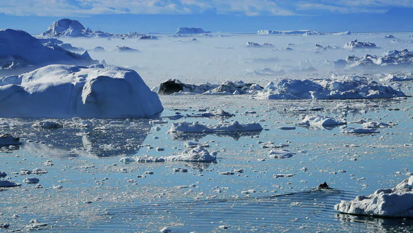 Small Craft Between Ice Floes & Icebergs Arctic Region