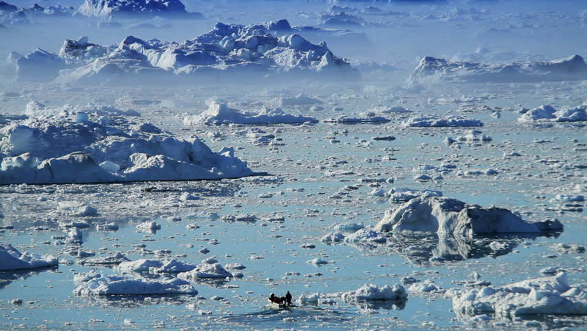 Small Craft Between Ice Floes & Icebergs Arctic Region
