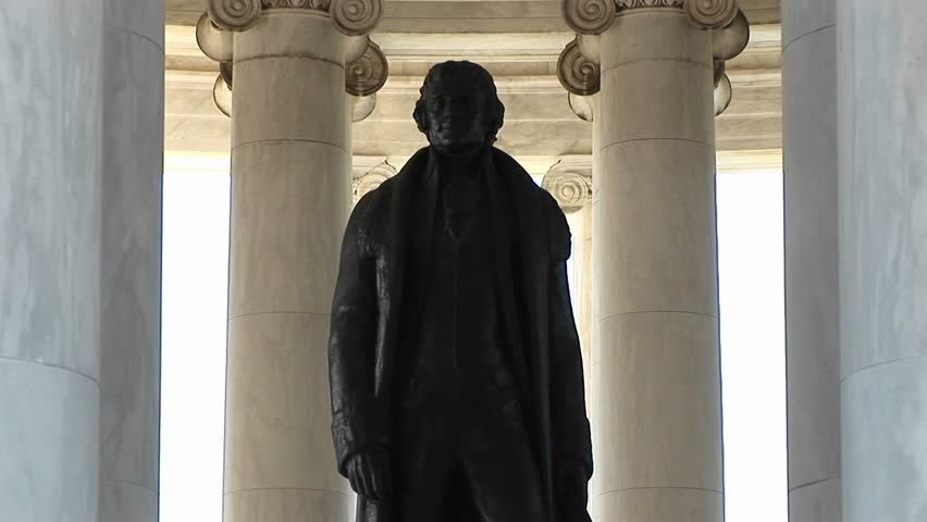 A statue of Thomas Jefferson is seen standing inside the Jefferson Memorial Building.