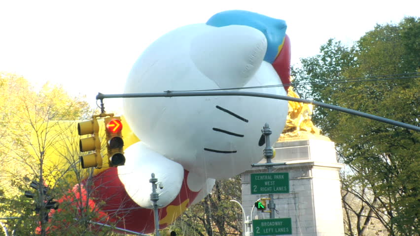 NEW YORK - NOVEMBER 24: Hello Kitty Balloon passes Columbus Circle at the Macy's Thanksgiving Day parade, November 24, 2011 in New York 