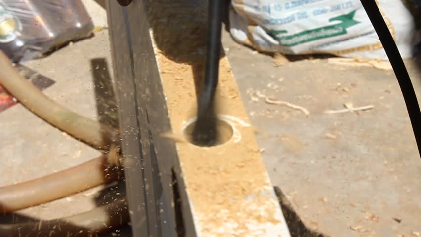 Carpentry tools are used to penetrate the door.