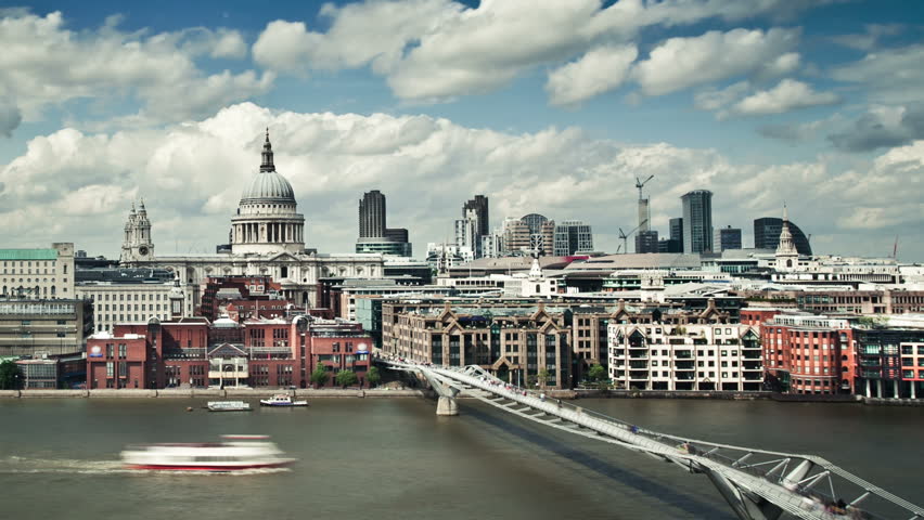 Timelapse of Millennium Bridge and St.Paul's Cathedral with puffy clouds