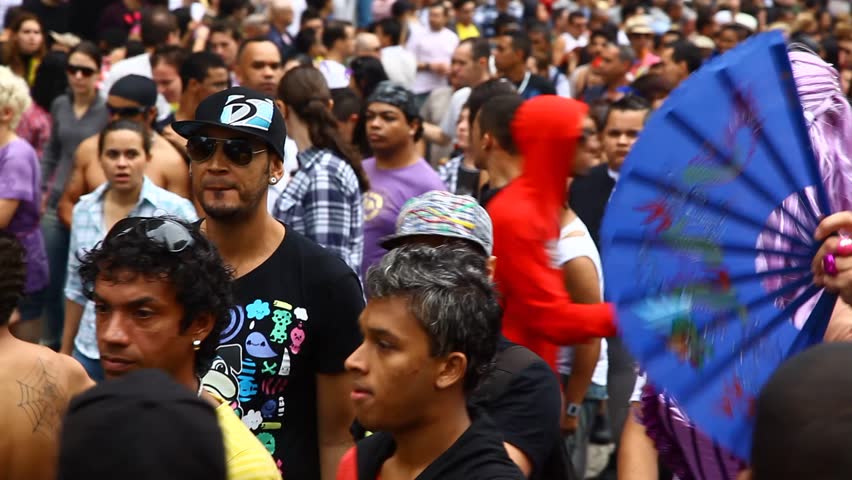 SAN PAULO, BRAZIL - CIRCA JUNE 2011: Crowds celebrate the LGBT Gay Pride Parade on Avenida Paulista circa June 2011 in San Paulo.