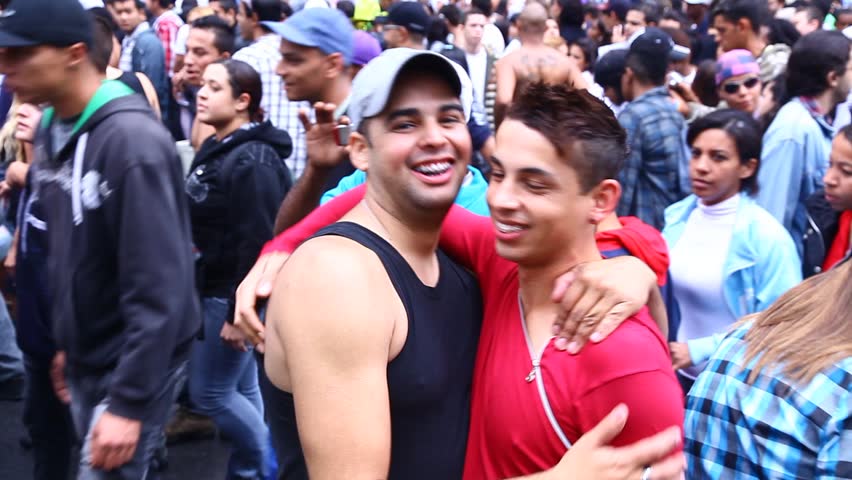 SAN PAULO, BRAZIL - CIRCA JUNE 2011: Crowds celebrate the LGBT Gay Pride Parade on Avenida Paulista circa June 2011 in San Paulo.