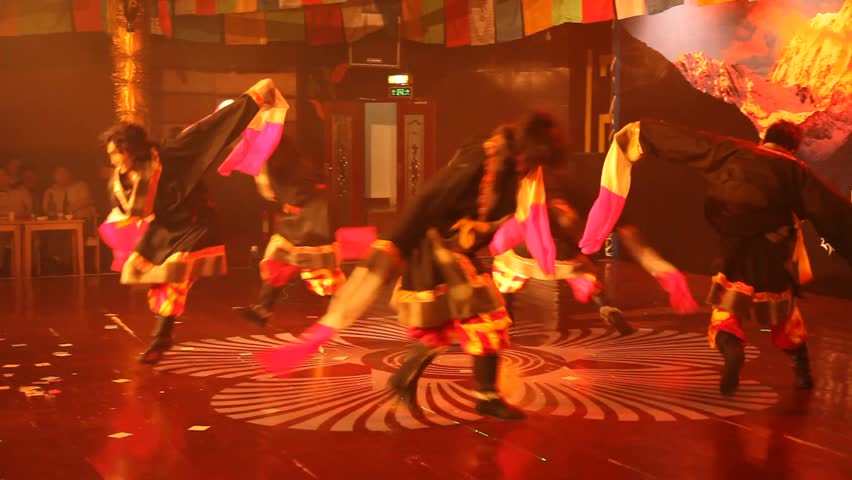 MOXI, CHINA - AUG 1, 2009: An event features Tibetan-Chinese folk dancing on August 1, 2009 in Moxi.