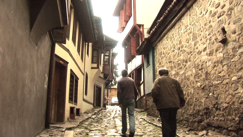 2 people walking down a street in Plovdiv