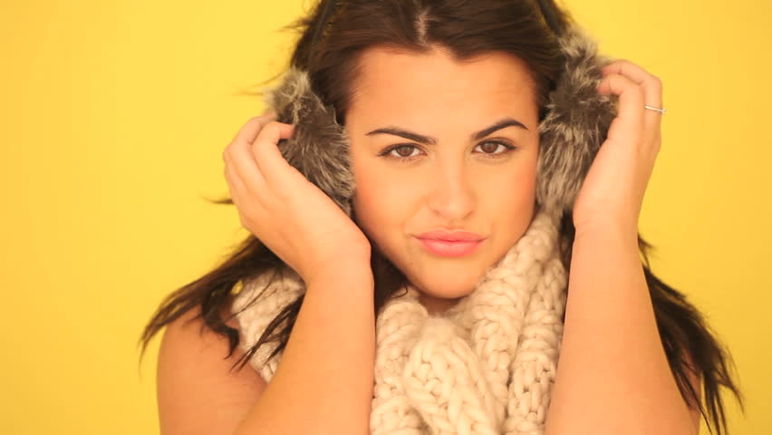 Playful Model With Crazy Expression, model with candid humorous expression in winter outfit.
