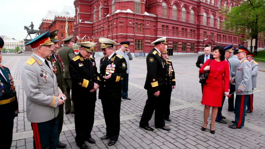MOSCOW - MAY 8: Navy and Internal Affairs High Command veterans walk around near Kremlin, before wreath laying ceremony on May 8, 2011 in Moscow, Russia
