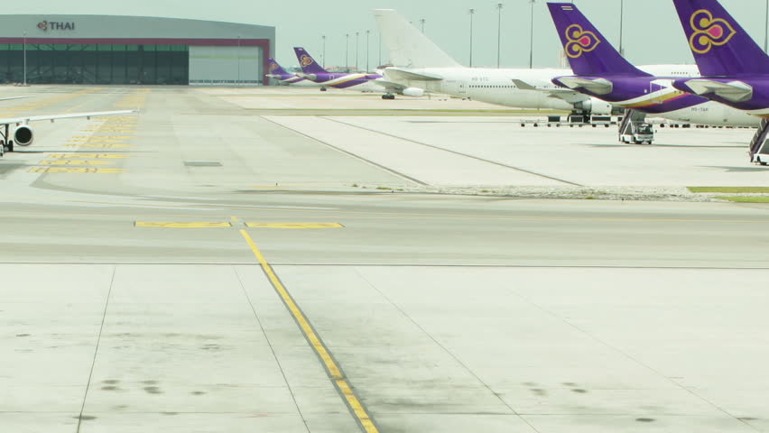 BANGKOK - JULY 22: (Timelapse View) Asia A320 Airbus Plane at Suvarnabhumi international airport on July 22, 2011 in Bangkok, Thailand. 