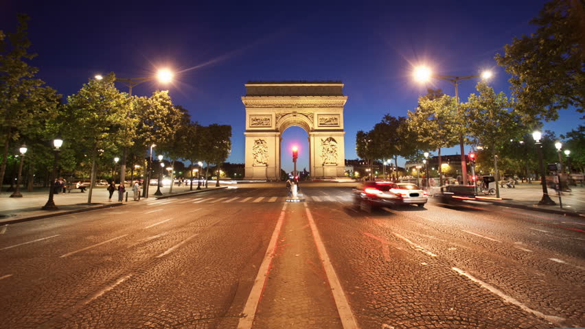 PARIS - JUNE 2011: Nighttime timelapse with the Arc de Triomphe as traffic passes by