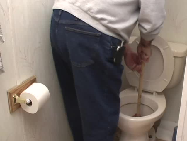 Unclogging a toilet