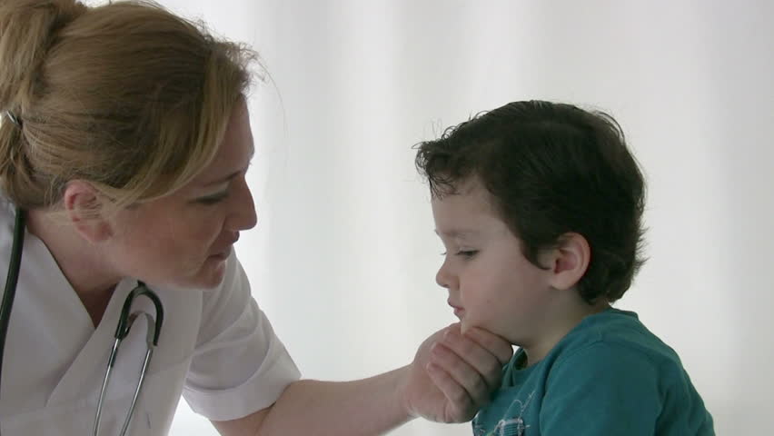 Pediatrician checking Little boy