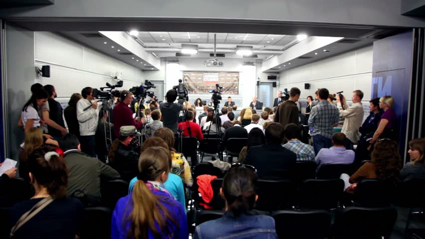 MOSCOW - MAY 6: Popular dutch DJ Armin Van Buuren speaks to journalists at press conferences in RIA Novosti hall, view from behind of operators, on May 6, 2011 in Moscow, Russia.