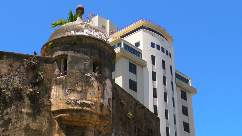 Puerto Rico - Very old sentry box and modern building.
