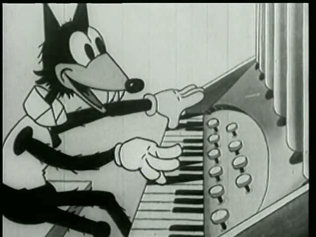 Wolf playing organ