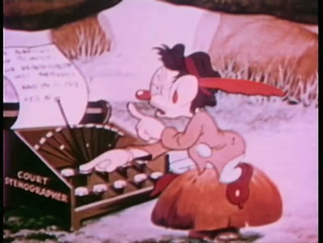 Typist dealing with troublesome typewriter