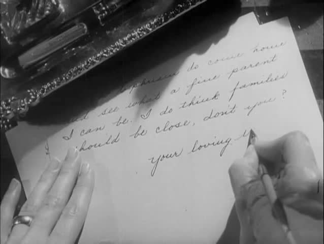 Close-up hands of woman writing letter