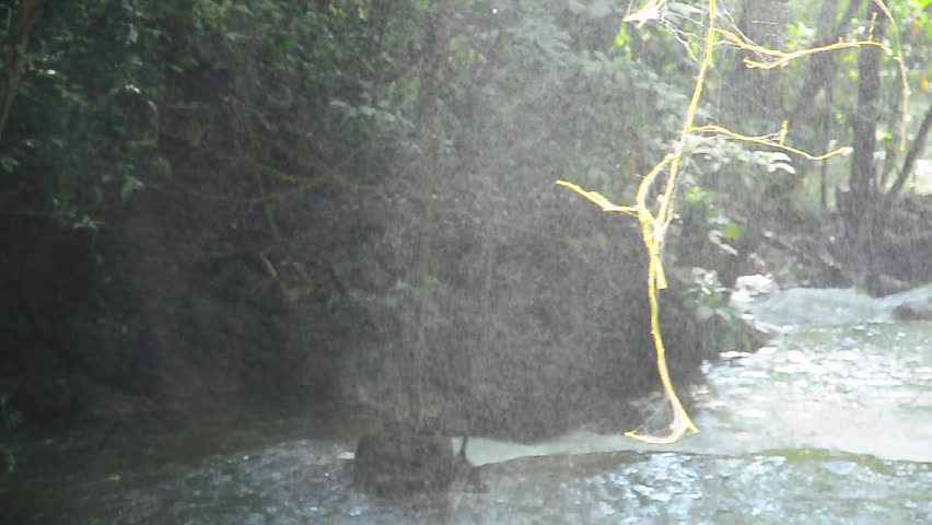 Water vapor of waterfall in forest 