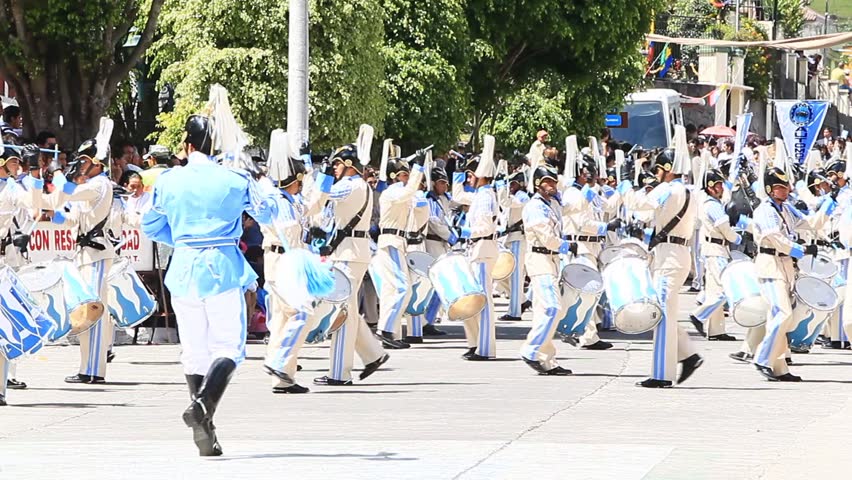 BANOS DE AGUA SANTA,ECUADOR - DECEMBER 16: Young students parade for the anniversary of canonization of the city on December 16, 2011 in Banos de Agua Santa, Ecuador. 