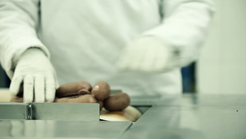 Sausages on a conveyor