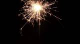 pyrotechnic material combustion, with sparks and smoke