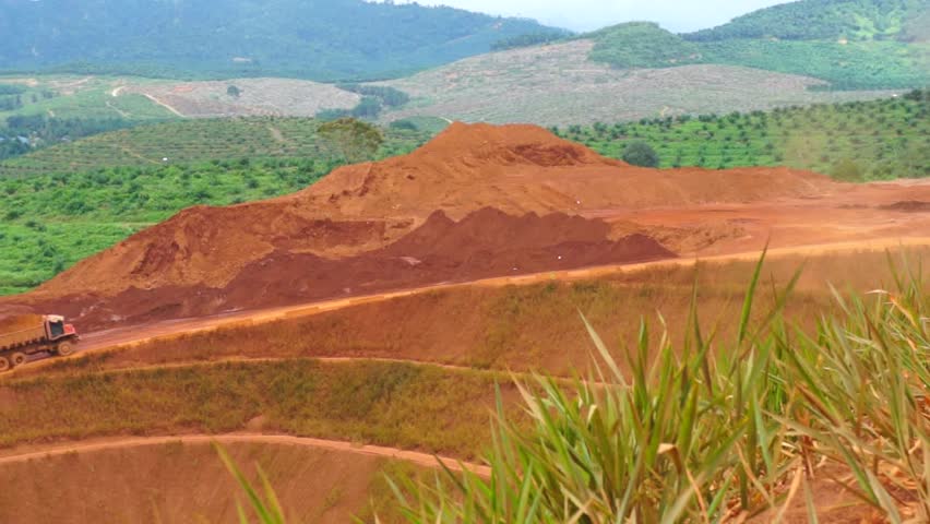 Lorry carry iron ore climb hill