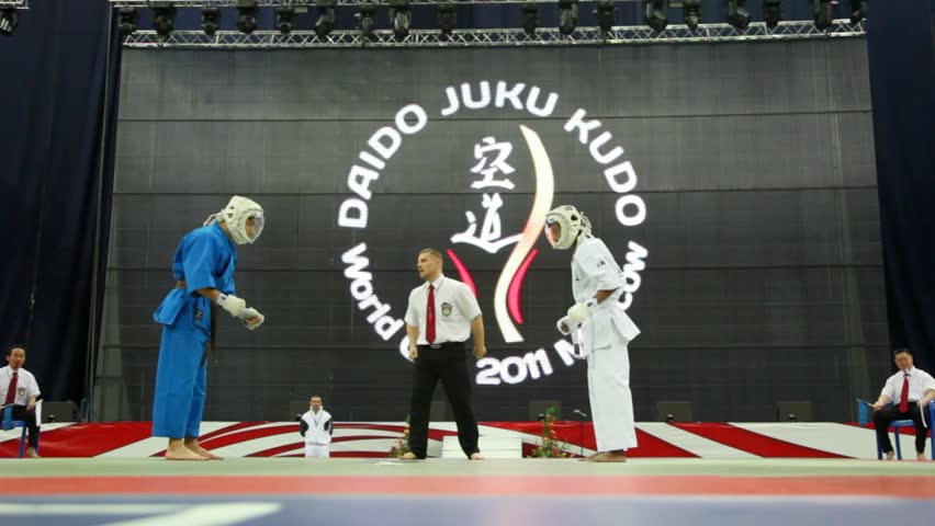MOSCOW - FEBRUARY 19: Short fight in Olympiysky Sports Complex with two fighters Suhail and his opponent with judges at World Cup 2011 KUDO on February 19, 2011 in Moscow, Russia.