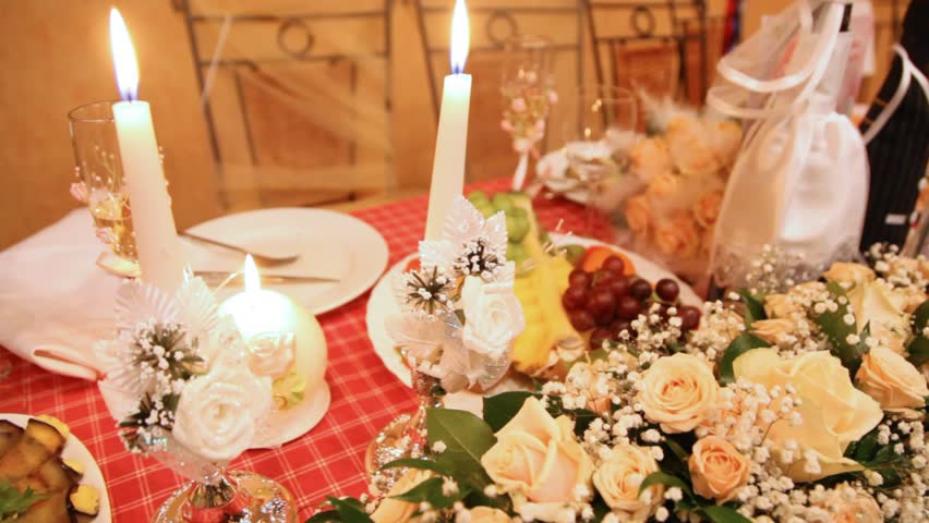 Wedding festive table with champagne fruit flowers and postcard With Wedding Day on Saturday, February 19, 2011