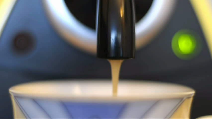 A epresso machine brewing a coffee espresso