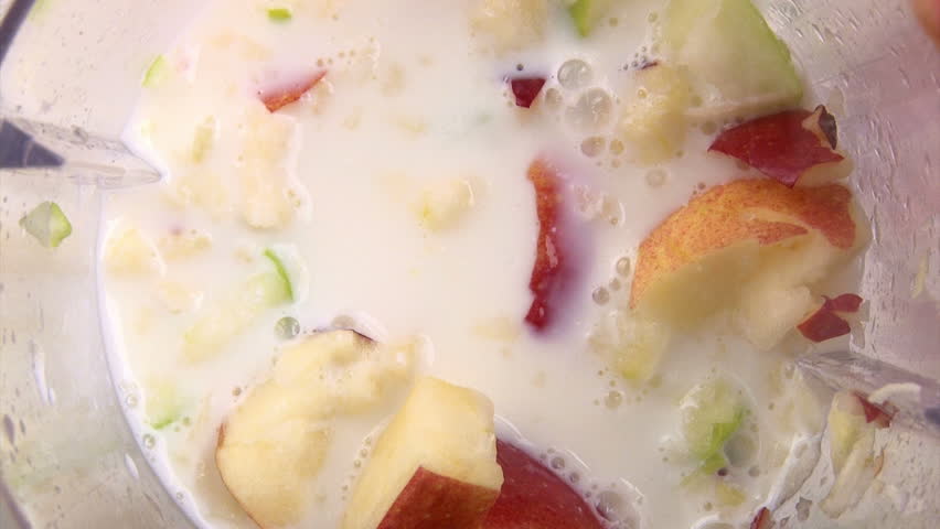 Mixing fruits, milk