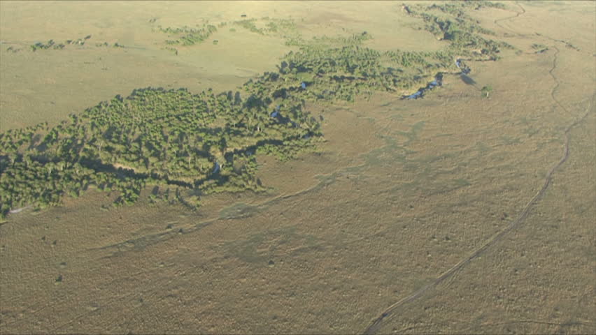A slow zoom to the Mara River in the Masai Mara, Kenya, Africa.  Taken from a Hot Air Balloon.