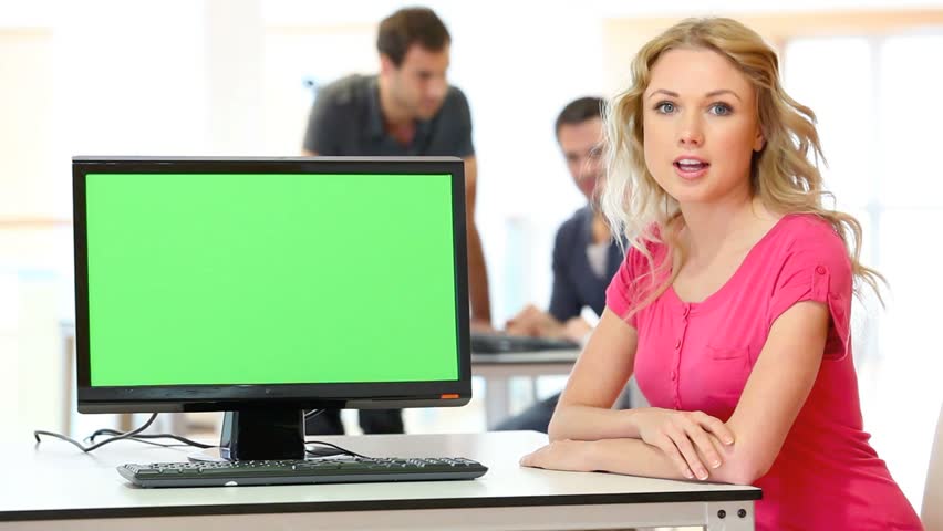 Woman presenting product on desktop computer screen